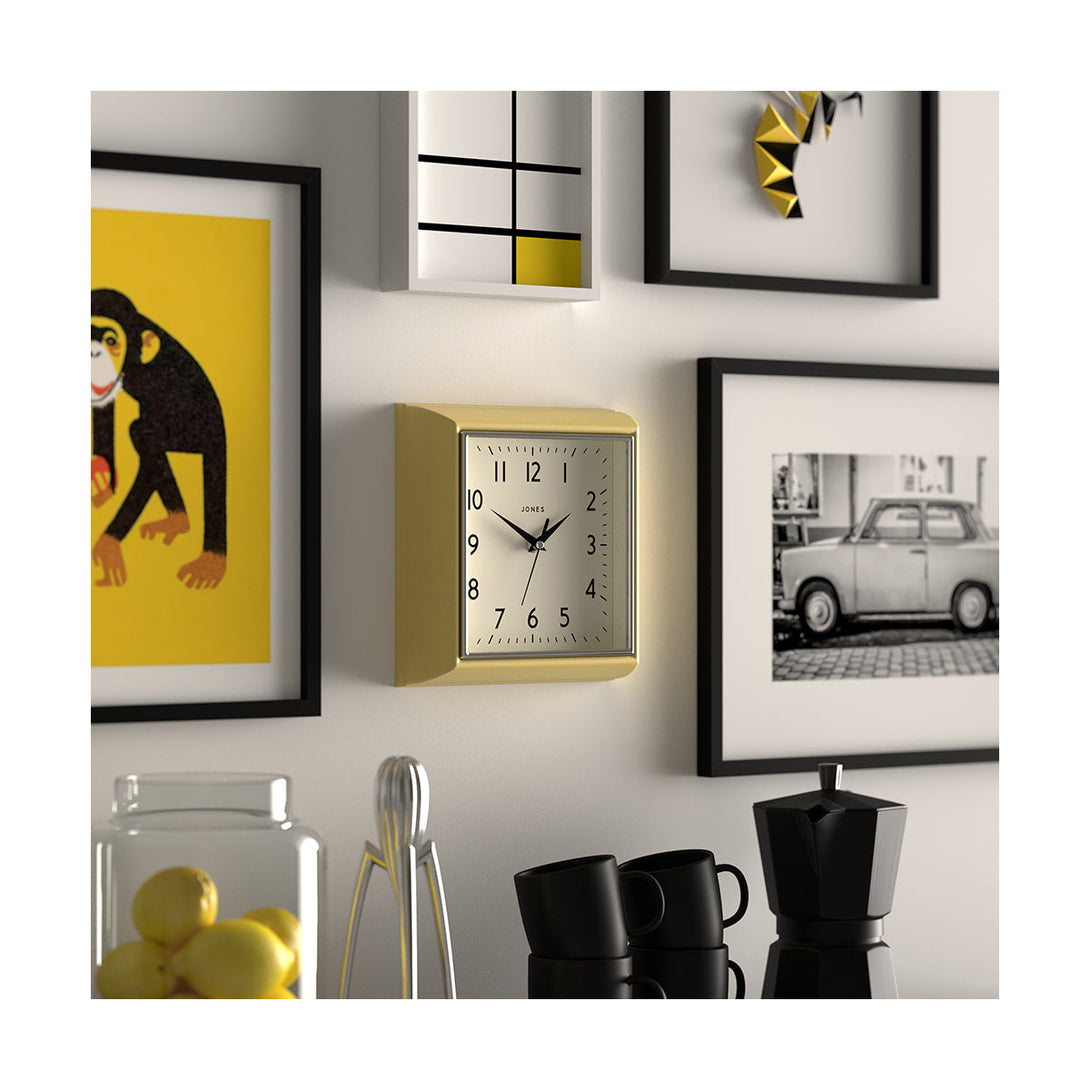 Style shot skew - Mustard small square wall clock by Jones Clocks in yellow with an Arabic dial and metal hands - JMUST741CHY