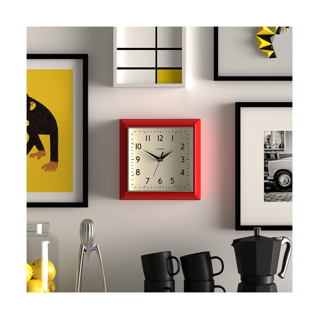 Style shot - Mustard wall clock by Jones Clocks in red with a square retro style case and a contemporary dial - JMUST741R
