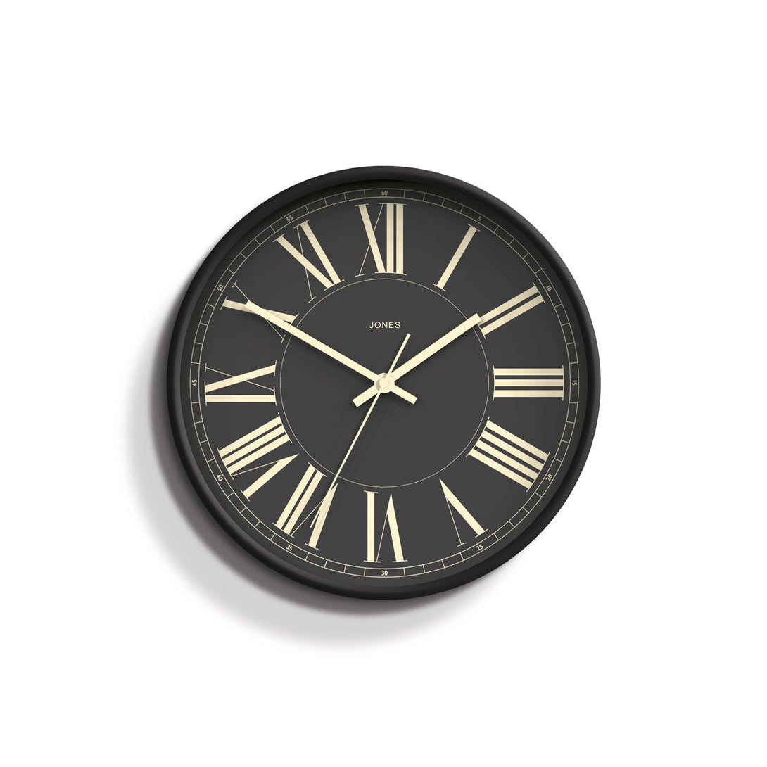 Front - Studio wall clock by Jones Clocks in charcoal grey with a decorative and classic Roman Numeral dial - JPEN260GGY