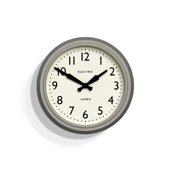Front - Telecom wall clock by Jones Clocks. A mid-century modern pepper grey case, bold Arabic dial, and retro propelling hands - JTCOM27PGY