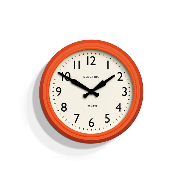 Front - Telecom wall clock by Jones Clocks. A mid-century modern orange case, bold Arabic dial, and retro propelling hands - JTCOM27PO