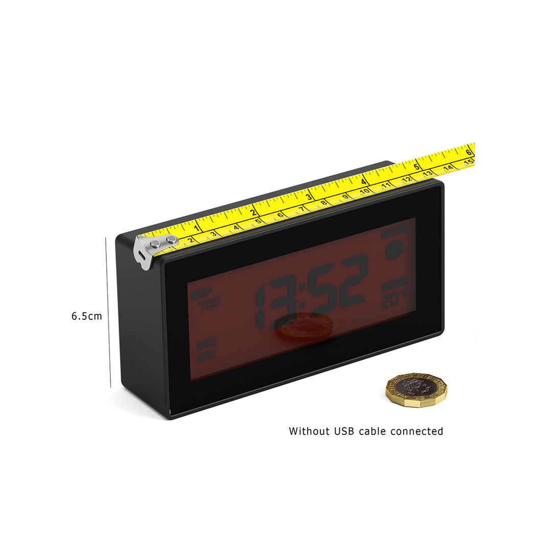 Skewed titled and dimensioned view of the Space Hotel Robot 10 LCD alarm clock in black with a red backlight