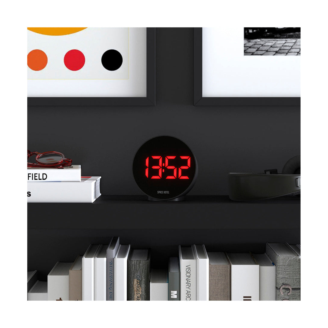Spherotron LED alarm clock by Space Hotel with a black case and red digital numbers - Style shot