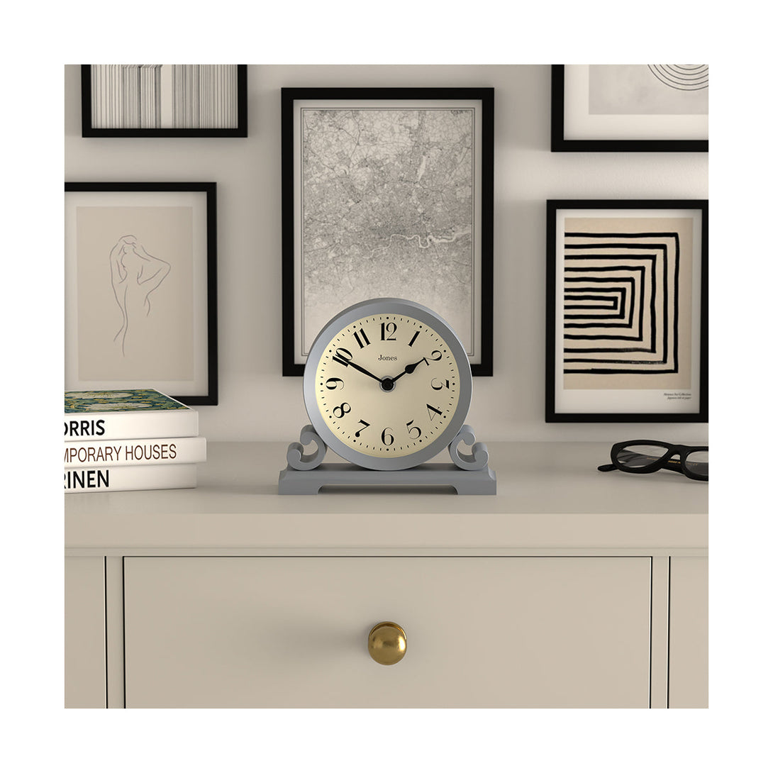 Style Shot - Saloon decorative mantel clock by Jones Clocks in French navy with a modern stylistic Arabic dial and metal spade hands - JSAL192FN