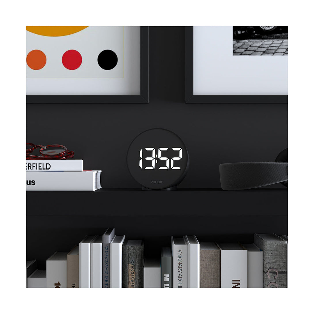 Spherotron LED alarm clock by Space Hotel with a black case and white digital numbers - Style Shot 1