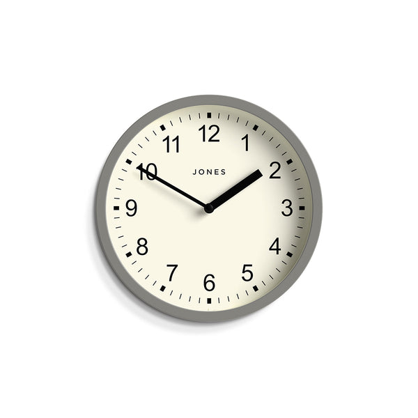 Front - Spin modern wall clock by Jones Clocks. A small and minimalistic light grey case with a contemporary dial - JSPIN136PGY
