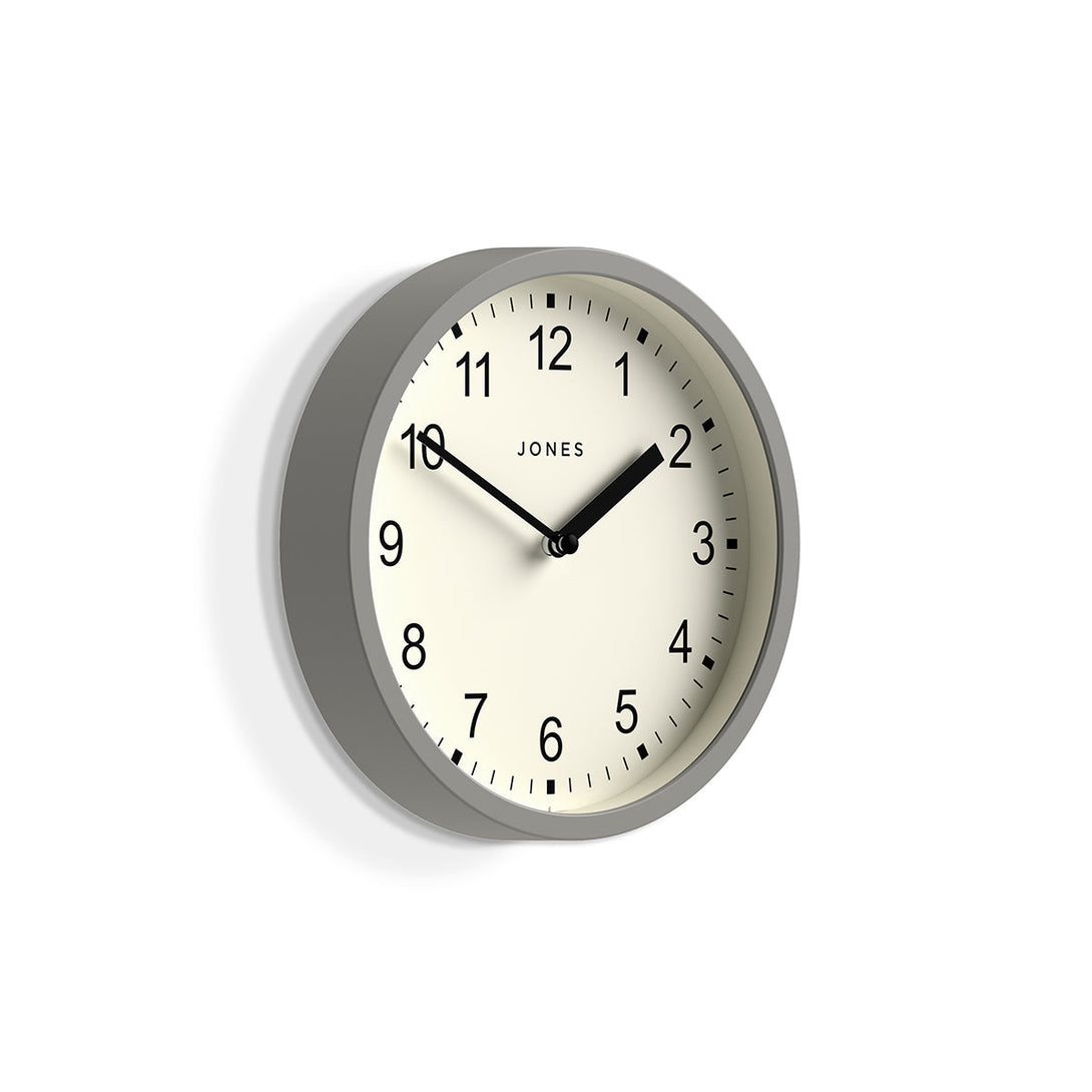 Skew - Spin modern wall clock by Jones Clocks. A small and minimalistic light grey case with a contemporary dial - JSPIN136PGY