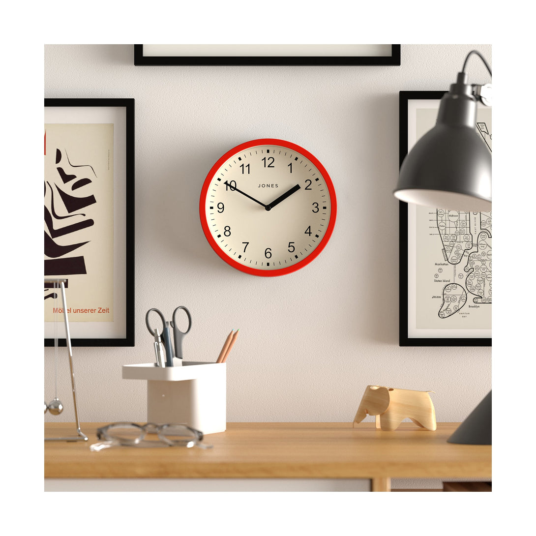 Style shot 1 - Spin modern wall clock by Jones Clocks. A small and minimalistic red case with a contemporary dial - JSPIN136R