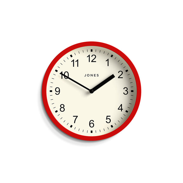 Front - Spin modern wall clock by Jones Clocks. A small and minimalistic red case with a contemporary dial - JSPIN136R