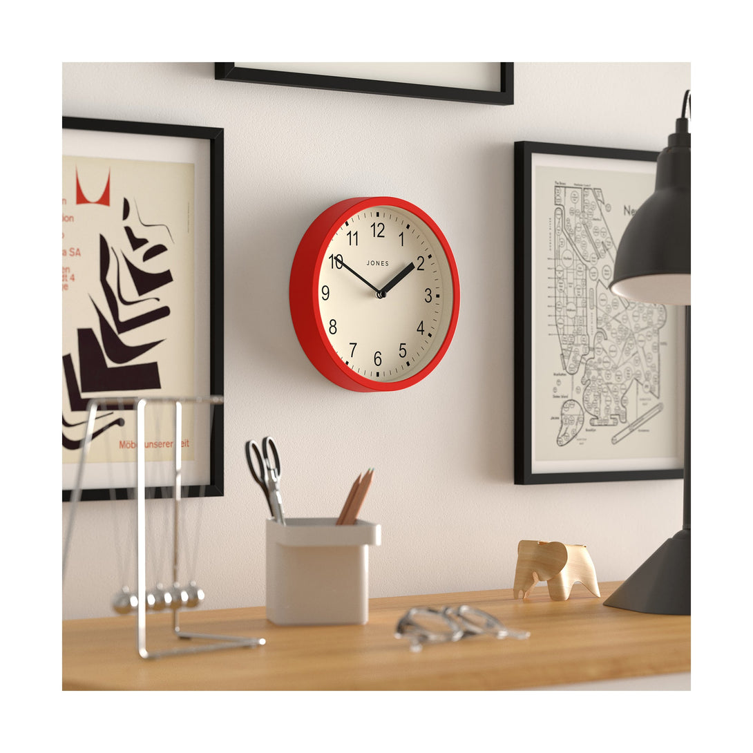 Style shot 2 - Spin modern wall clock by Jones Clocks. A small and minimalistic red case with a contemporary dial - JSPIN136R