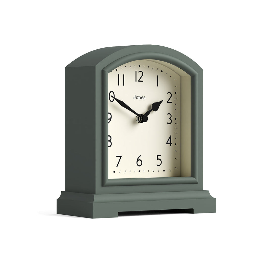 Skew - Tavern mantel clock by Jones Clocks. A classic green case with an Arabic Numeral dial and black spade hands - JTAV243ASG