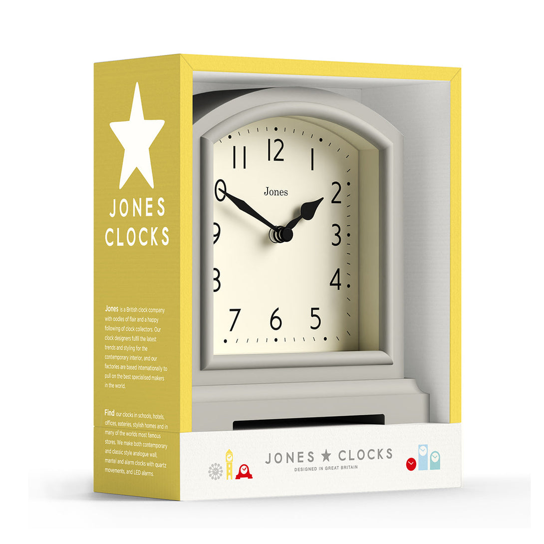 Packaging - Tavern mantel clock by Jones Clocks. A classic light grey case with an Arabic Numeral dial and black spade hands - JTAV243OGY