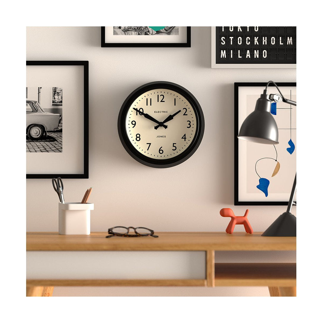 Office - Telecom wall clock by Jones Clocks. A mid-century modern black case, bold Arabic dial, and retro propelling hands - JTCOM27K