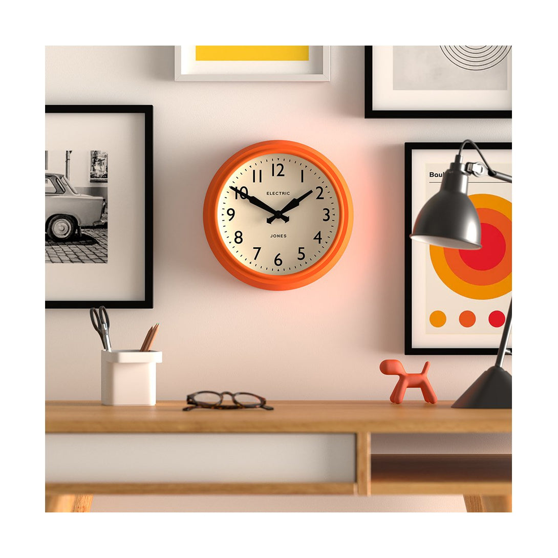 Office - Telecom wall clock by Jones Clocks. A mid-century modern orange case, bold Arabic dial, and retro propelling hands - JTCOM27PO