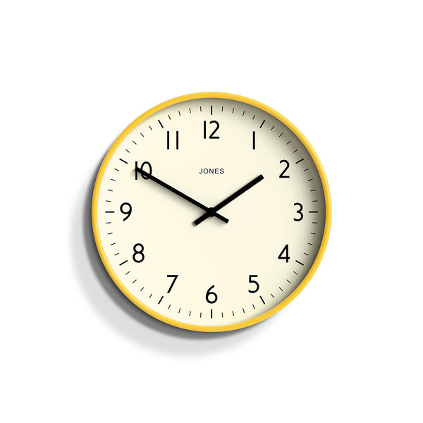 Front - Studio wall clock by Jones Clocks in yellow with an easy-to-read and minimalistic dial - JPEN52CHY