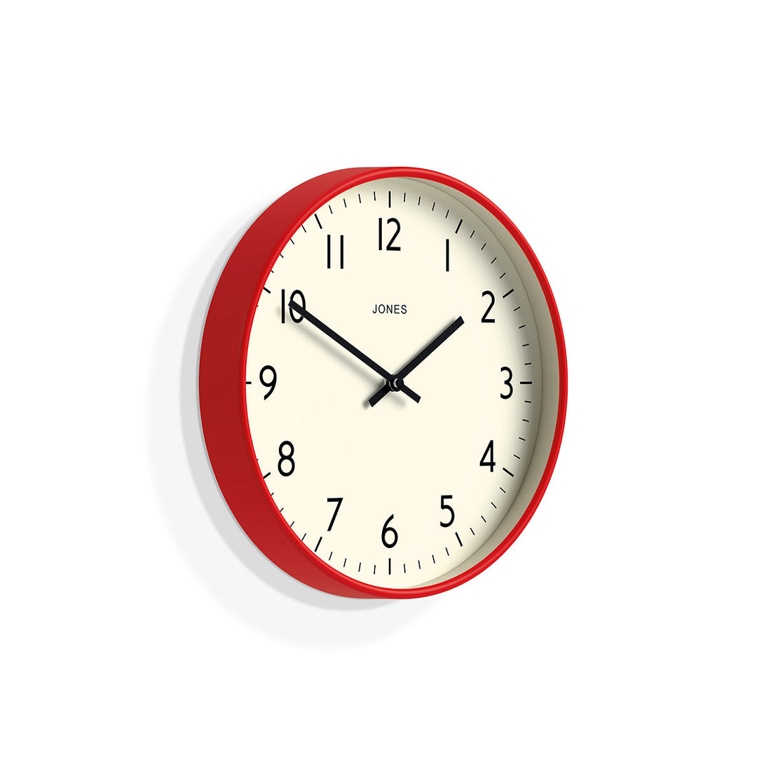 Skew - Studio wall clock by Jones Clocks in red with an easy-to-read and minimalistic dial - JPEN52R