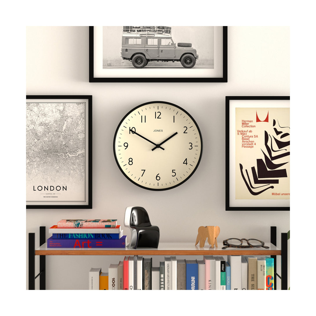 Style shot - Studio wall clock by Jones Clocks in black with an easy-to-read and minimalistic dial - JPEN52K
