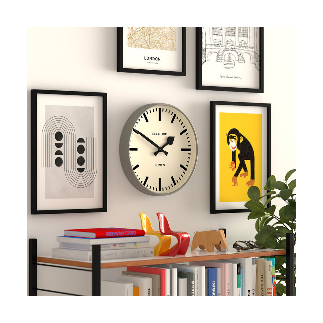 Style shot 2 - Tiger wall clock by Jones Clocks. A contemporary grey case paired with a bold black railway dial and spade / baton black hands - JTIG38PGY