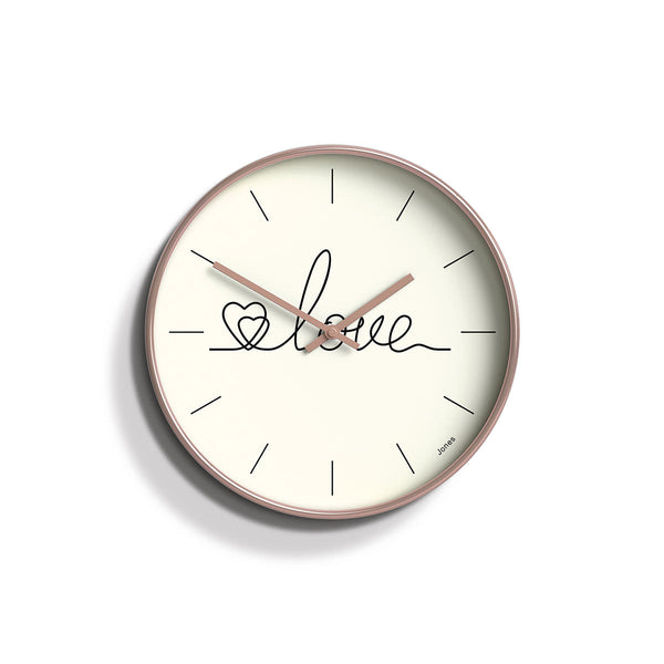 Front - Decorative Love wall clock by Jones Clocks. An illustrative 'love' and cream dial in a rose gold/copper chrome case - JTIG82RG