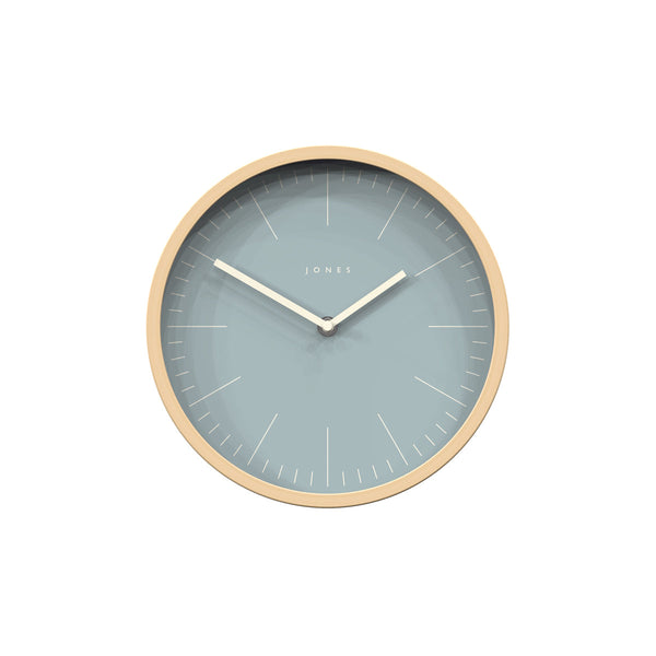 Front - University wall clock by Jones Clocks. Light faux wood case with a minimalist light blue marker dial. A modern, scandi style clock for kitchen, living room, bedroom or office - JUNI640PLY25