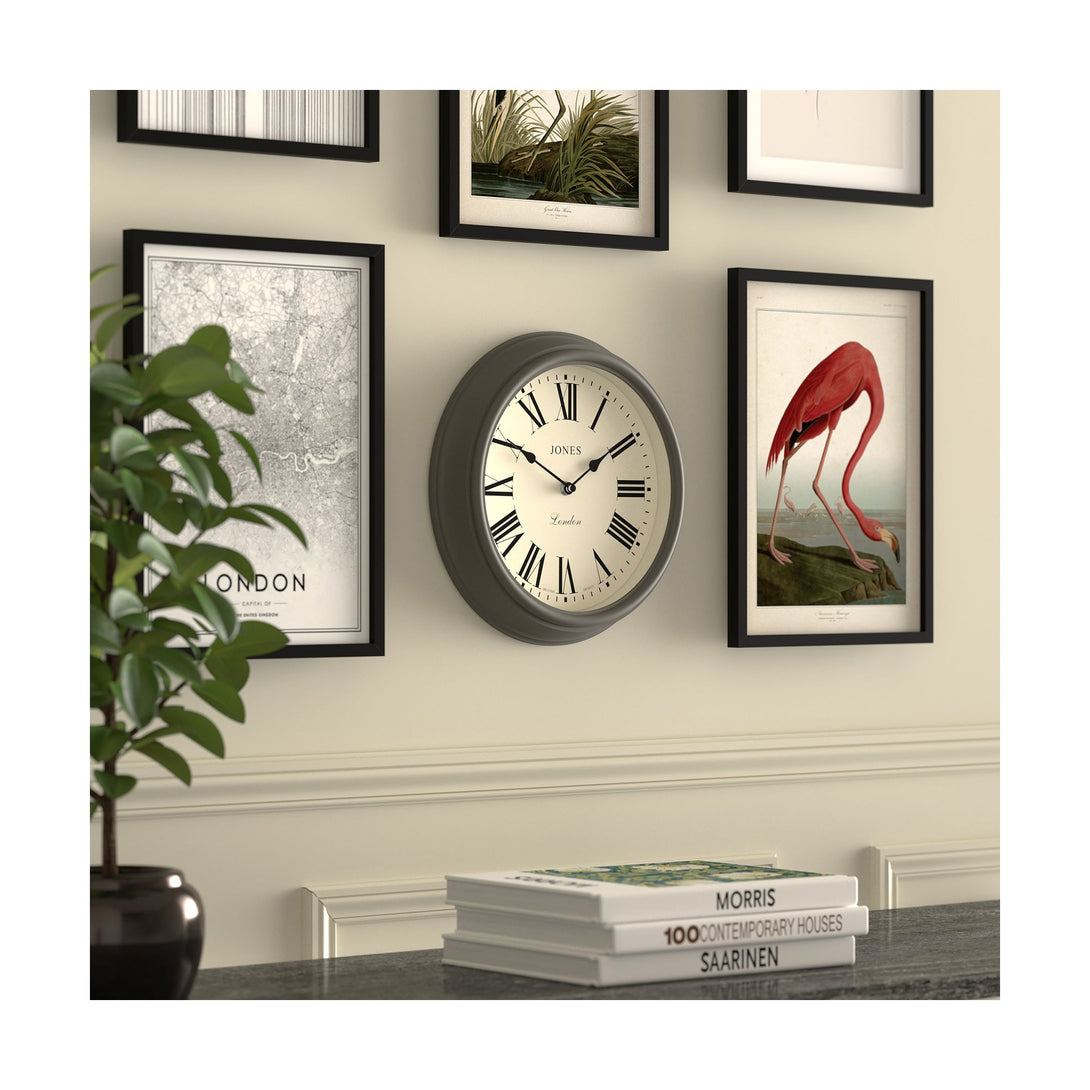 Gallery wall skew - Venetian wall clock by Jones Clocks. A classic Roman numeral dial with traditional spade hands, inside a decorative blizzard grey case - JVEN319BGY