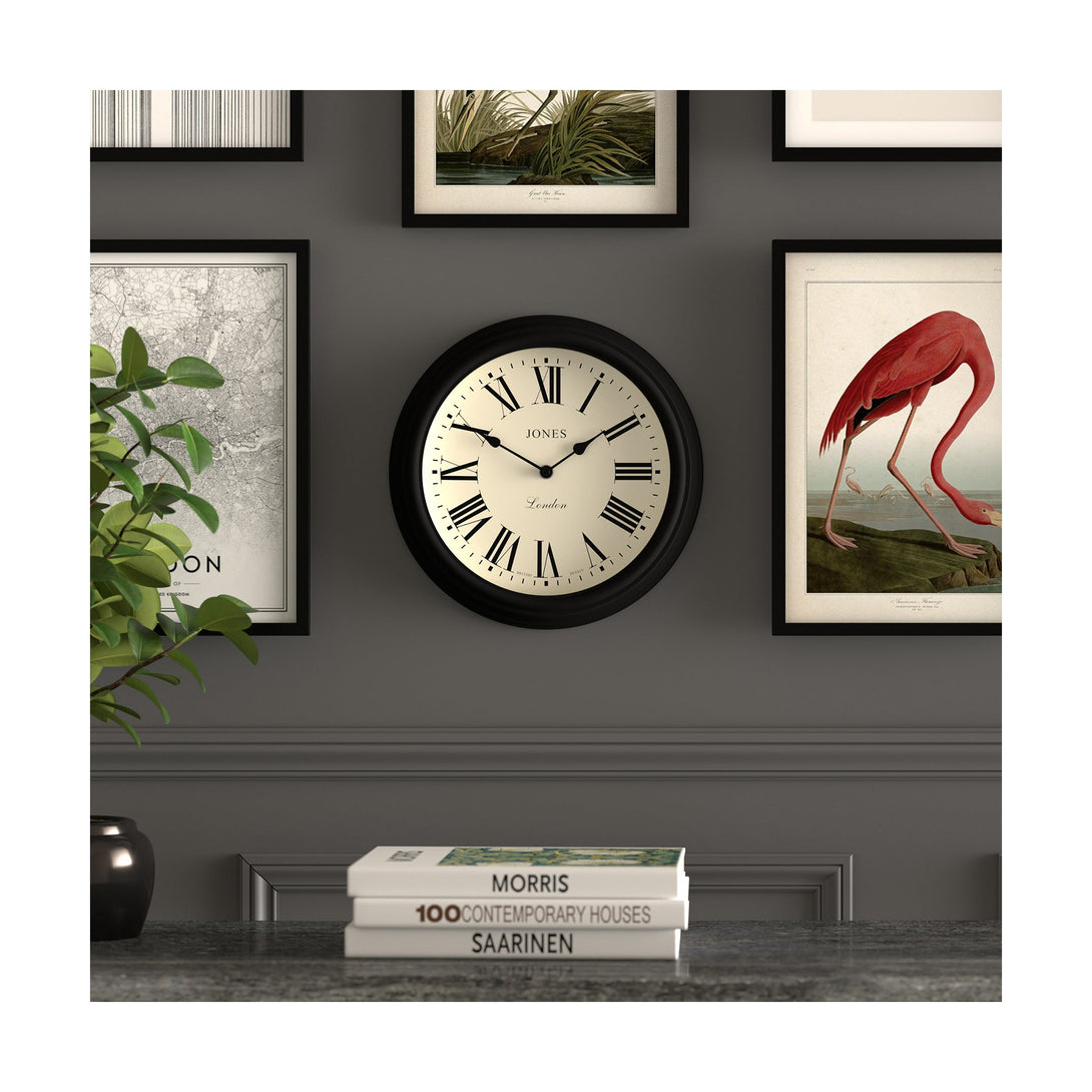 Gallery wall - Venetian wall clock by Jones Clocks. A classic Roman numeral dial with traditional spade hands, inside a decorative black case - JVEN319K