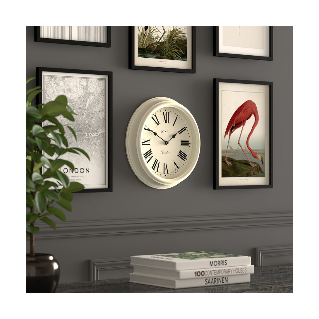 Gallery wall skew - Venetian wall clock by Jones Clocks. A classic Roman numeral dial with traditional spade hands, inside a decorative cream case - JVEN319LW