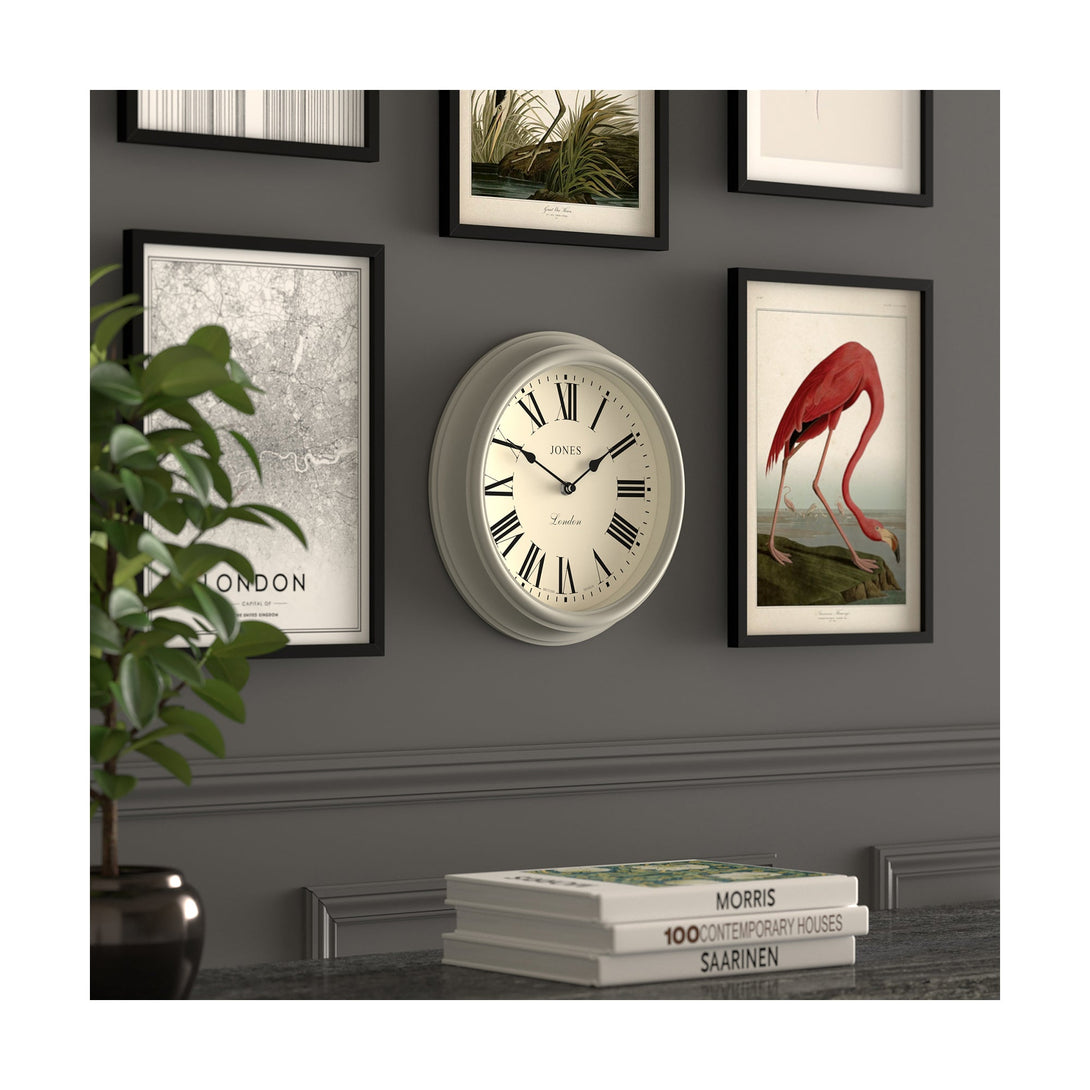 Gallery wall skew - Venetian wall clock by Jones Clocks. A classic Roman numeral dial with traditional spade hands, inside a decorative pepper grey case - JVEN319PGY
